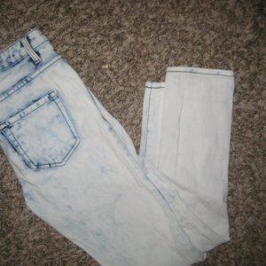 Distressed acid wash jeans
